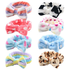 3 otters front packaging showing eight tie-dye headbands, appealing set