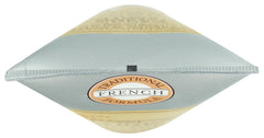 A LA MAISON bottle beside measuring tape showing compact size