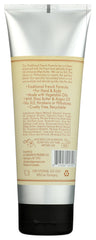 A LA MAISON creamy lotion texture close-up demonstrating smooth, non-greasy absorption
