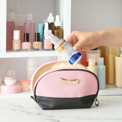 AcneFree bottle on nightstand as part of calming skincare routine