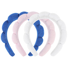 ACO-UINT front view of three headbands showing cloud shapes and cheerful colors