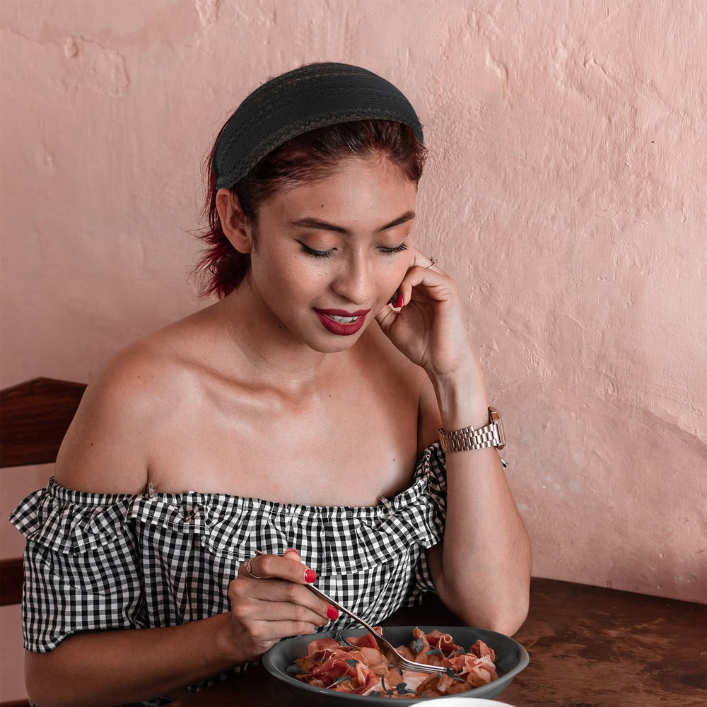 ACO-UINT worn side profile illustrating polished everyday styling benefit