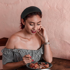 ACO-UINT worn side profile illustrating polished everyday styling benefit