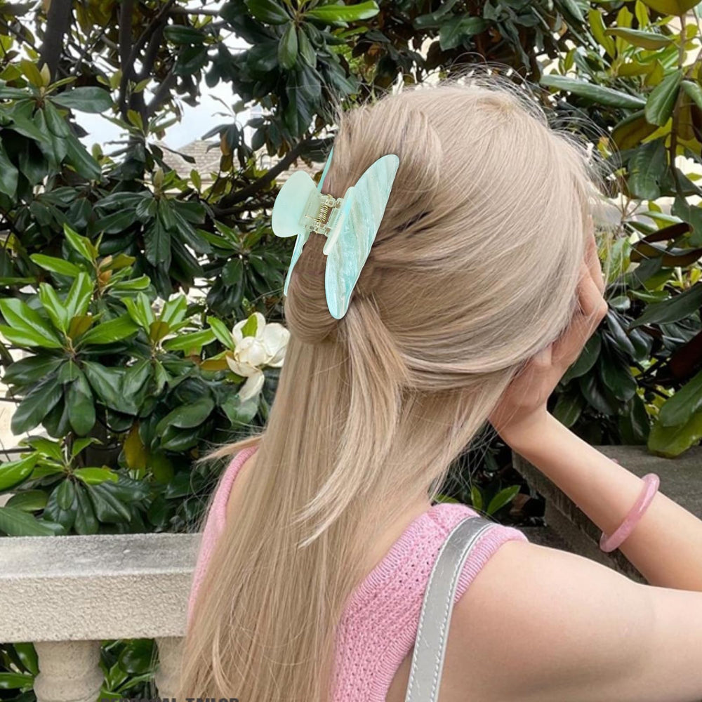 ACO-UINT clipped in hair updo illustrating quick styling and all-day hold benefit