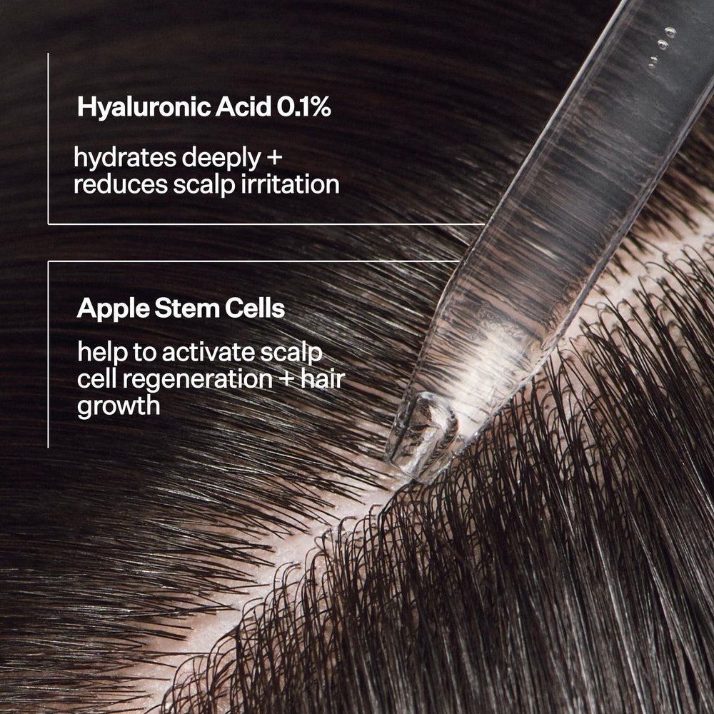 ACT+ ACRE applying serum directly to scalp demonstrating targeted use