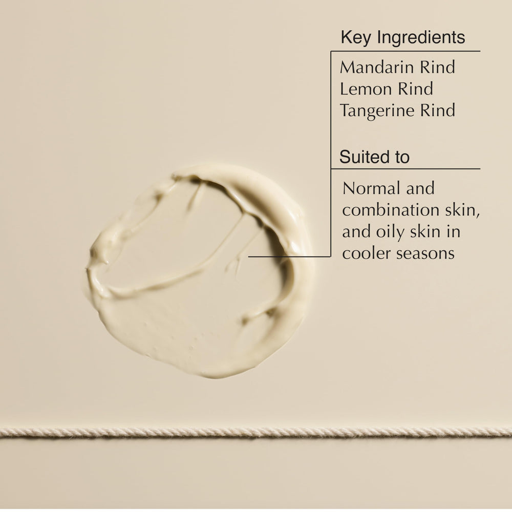 Aesop mandarin cream open jar on palm showing easy pickup and fast absorption