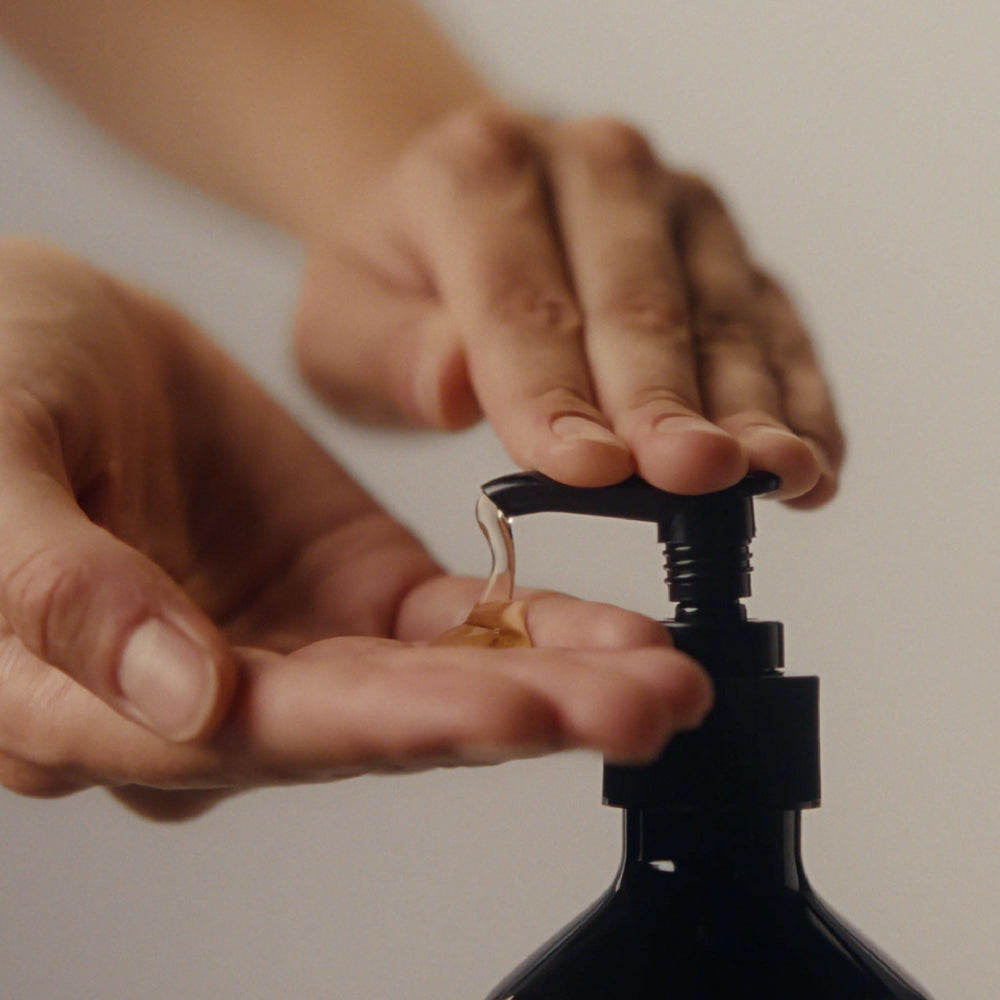 Aesop hand balm spread on skin illustrating smooth absorption and conditioning benefit