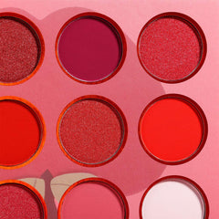 Afflano brush applying shimmer shade to lid for buildable intensity