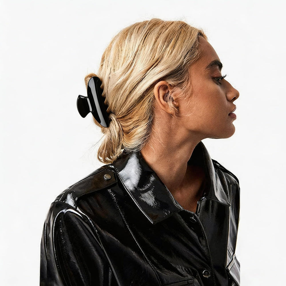 Aileam clip securing a high bun demonstrating secure non-slip hold