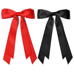 Aileam bow held in hand showing accurate 5.2 by 8 inch scale and proportion