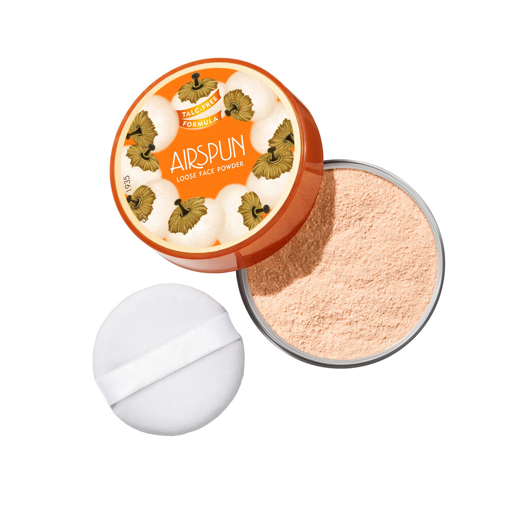 Airspun loose powder texture closeup revealing cloudlike, ultra-fine particles