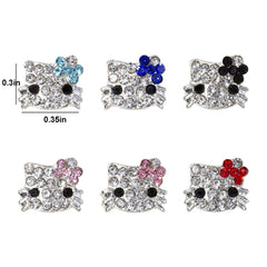 akutoer tweezers and glue beside charms showing easy precise application