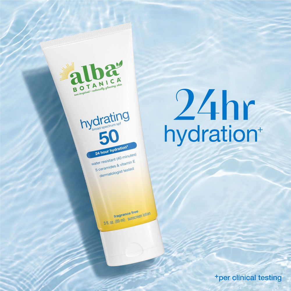 Alba Botanica 3 fl oz tube next to a hand showing compact travel-ready size benefit