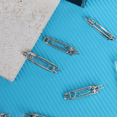 Albooss scale comparison next to ruler showing 5.6 cm clip length for fit