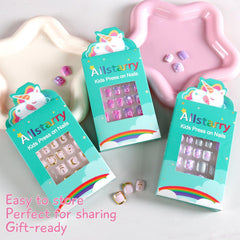 Allstarry short nails on a child's hand demonstrating size and comfortable fit