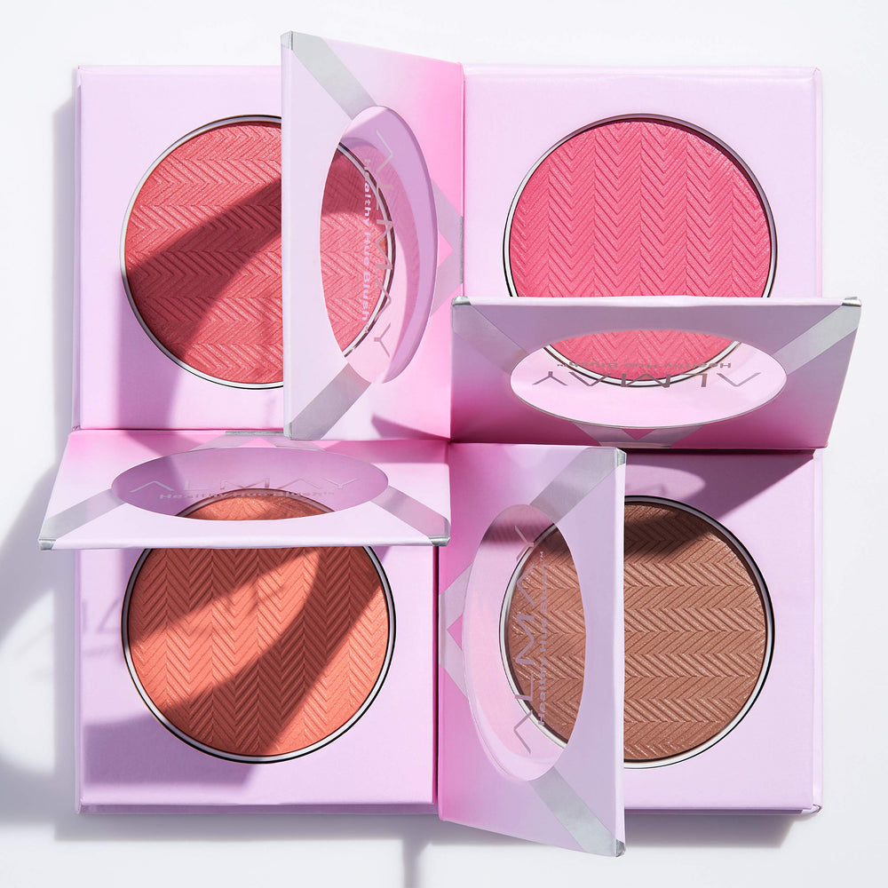 Almay blush in handbag lifestyle shot showing everyday portability benefit