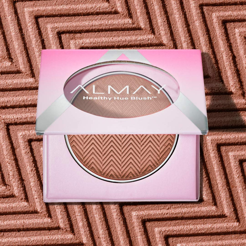 Almay close-up of blush pan texture showing smooth blendability benefit
