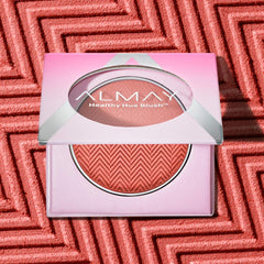 Almay close-up of powder pan revealing fine texture for smooth blending