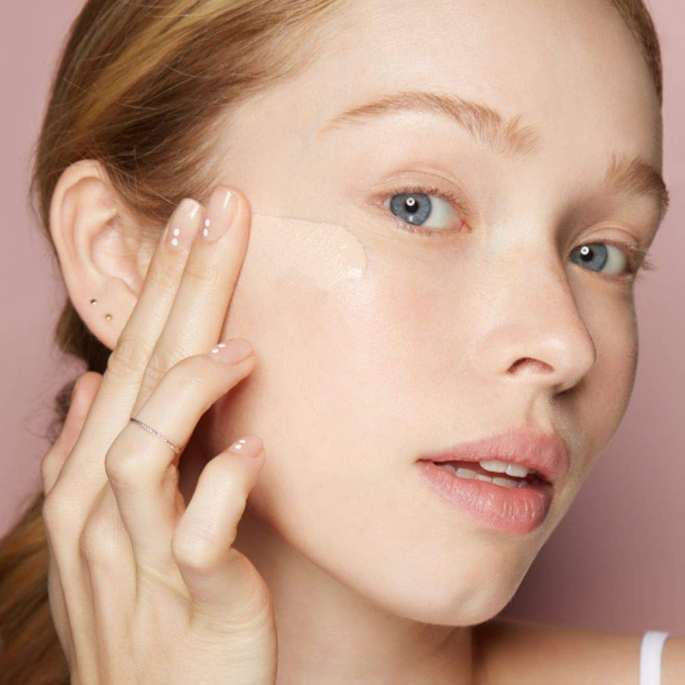 Almay foundation applied with sponge highlighting smooth application and coverage