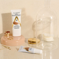 Woman wearing Almay foundation in lifestyle scene showing natural finish