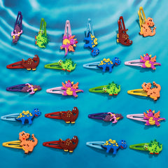 Alomois dinosaur clips arranged as party favors for easy gifting