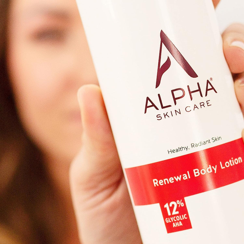 Alpha bottle held in hand for scale, shows 12 oz size and travel-friendly benefit