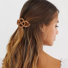 Amariver barrettes used in styled hair for neat, comfortable hold