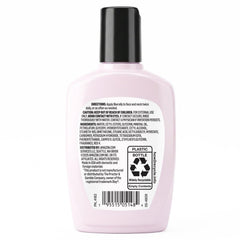 Amazon Essentials next to everyday items illustrating 6 fl oz travel-friendly size