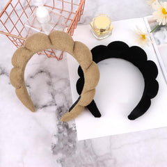 AMCAMI headbands arranged as a gift set ready for giving