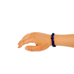Amelia Beauty scrunchie holding a ponytail neatly with comfortable secure hold