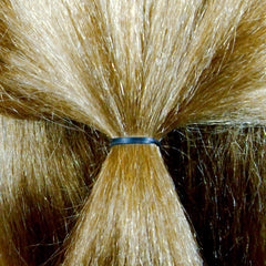Amelia Beauty ponytail held with band showing strong hold during activity