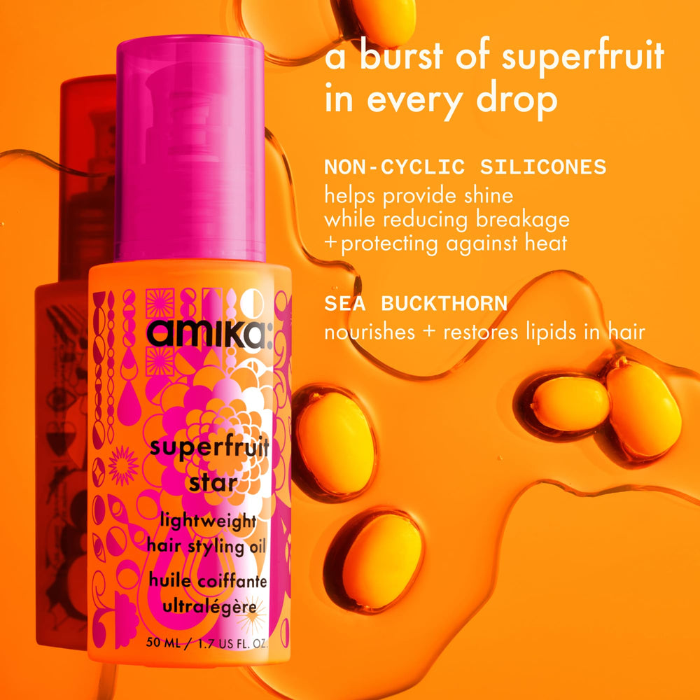 Amika oil drop on fingertip showing lightweight texture for quick absorption benefit