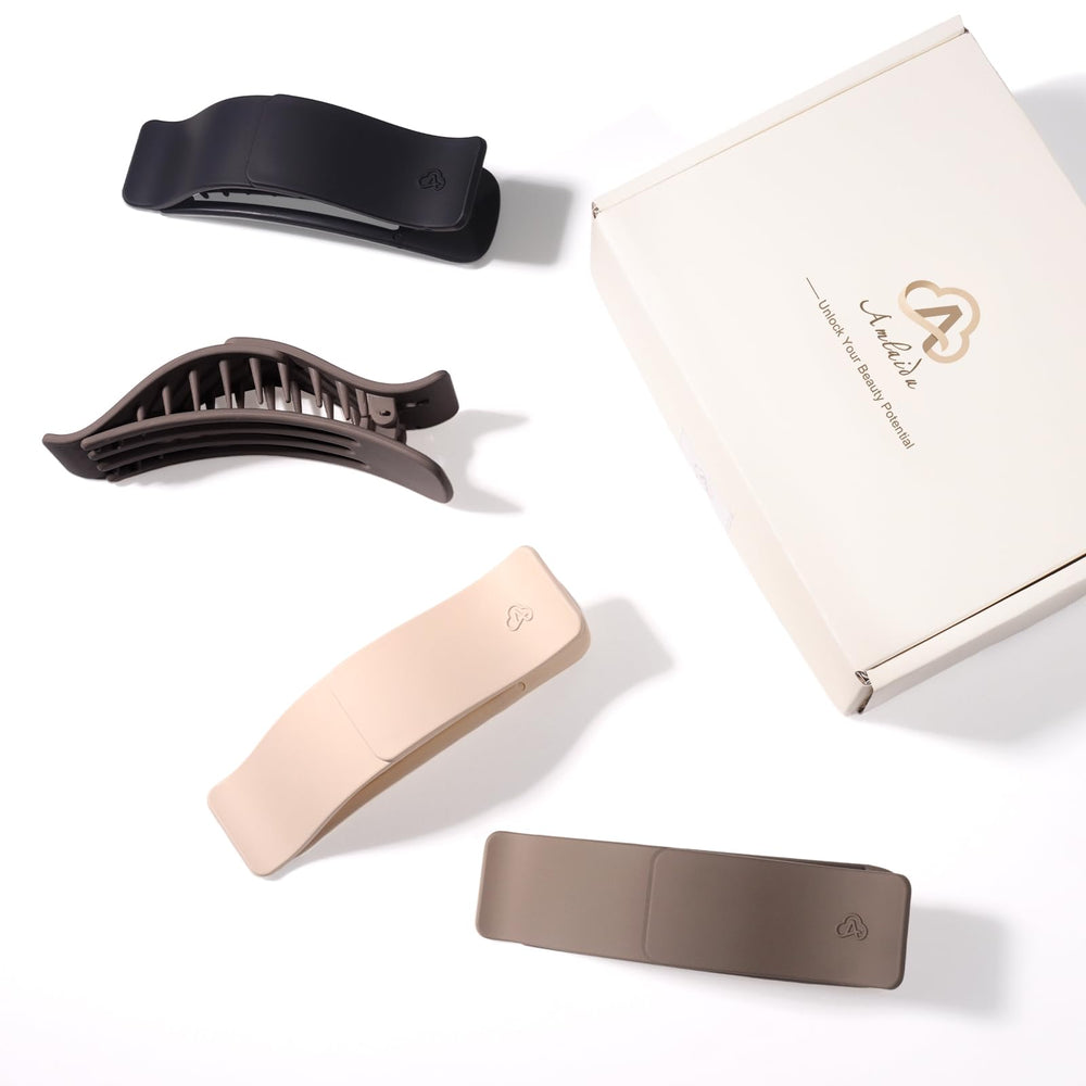 Amlaidu clip in a hand to show medium size and easy portability