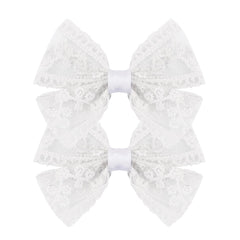 Amybasic front view of two lace bow clips showing vintage style and easy clipping