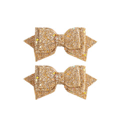 Amybasic front view of gold sequin clip shows sparkle and style benefit