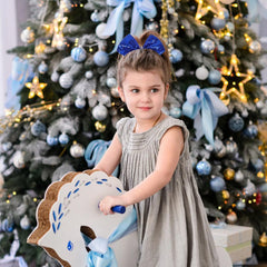 AMYDECOR model wearing bow in ponytail demonstrating full movement