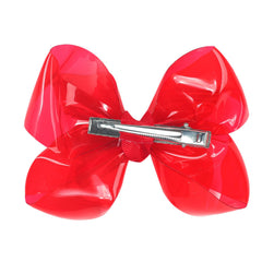 AMYDECOR bow next to a ruler showing 4-inch size for easy scale reference