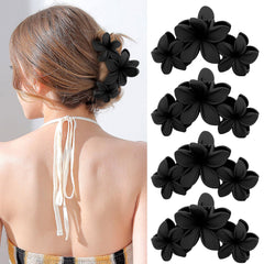 ANBALA front view of four black plumeria clips showing shape and size, easy styling