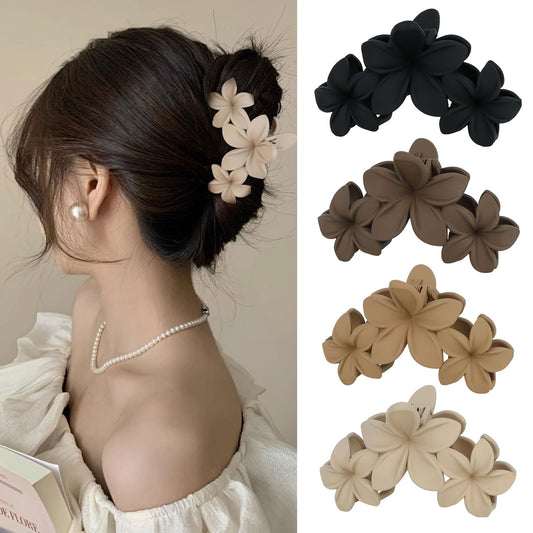 ANBALA front view of four plumeria clips showing colors and matte finish, stylish accessory