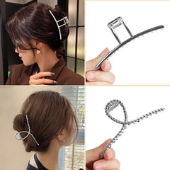 ANBALA clip next to hand showing large size for fuller hair sections