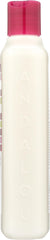 Andalou Naturals 11.5 ounce tube beside common objects showing scale
