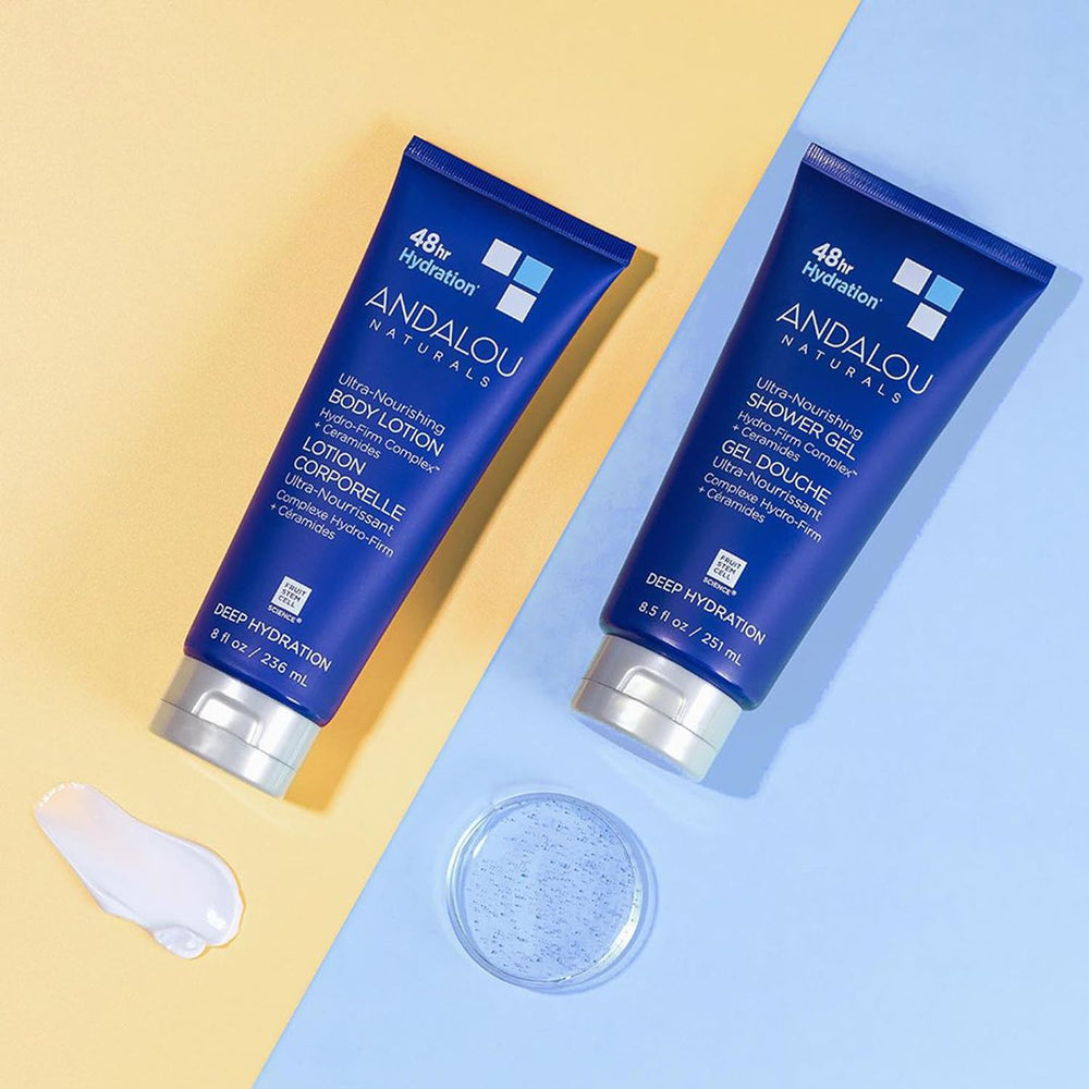 Andalou Naturals bottle next to hand for scale showing convenient 8.5 fl oz size