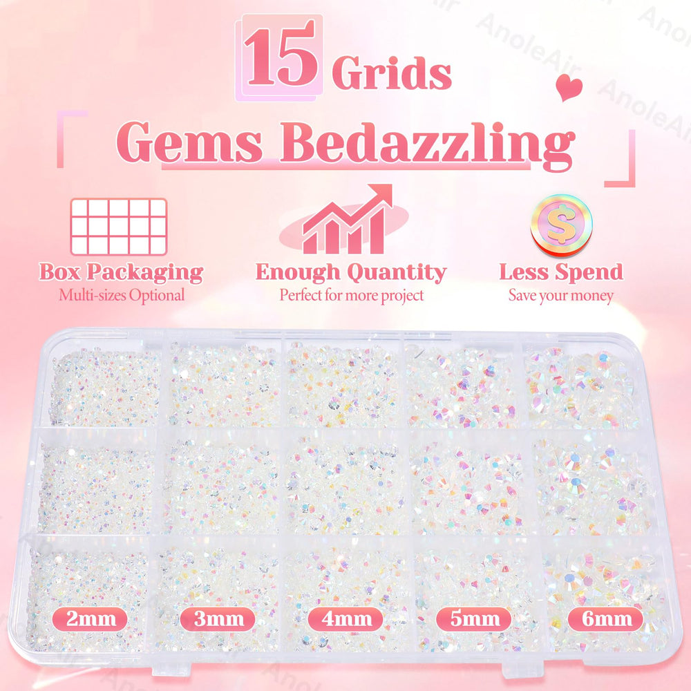 Spread of AnoleAir mixed 2–6mm rhinestones on black surface, useful for design planning