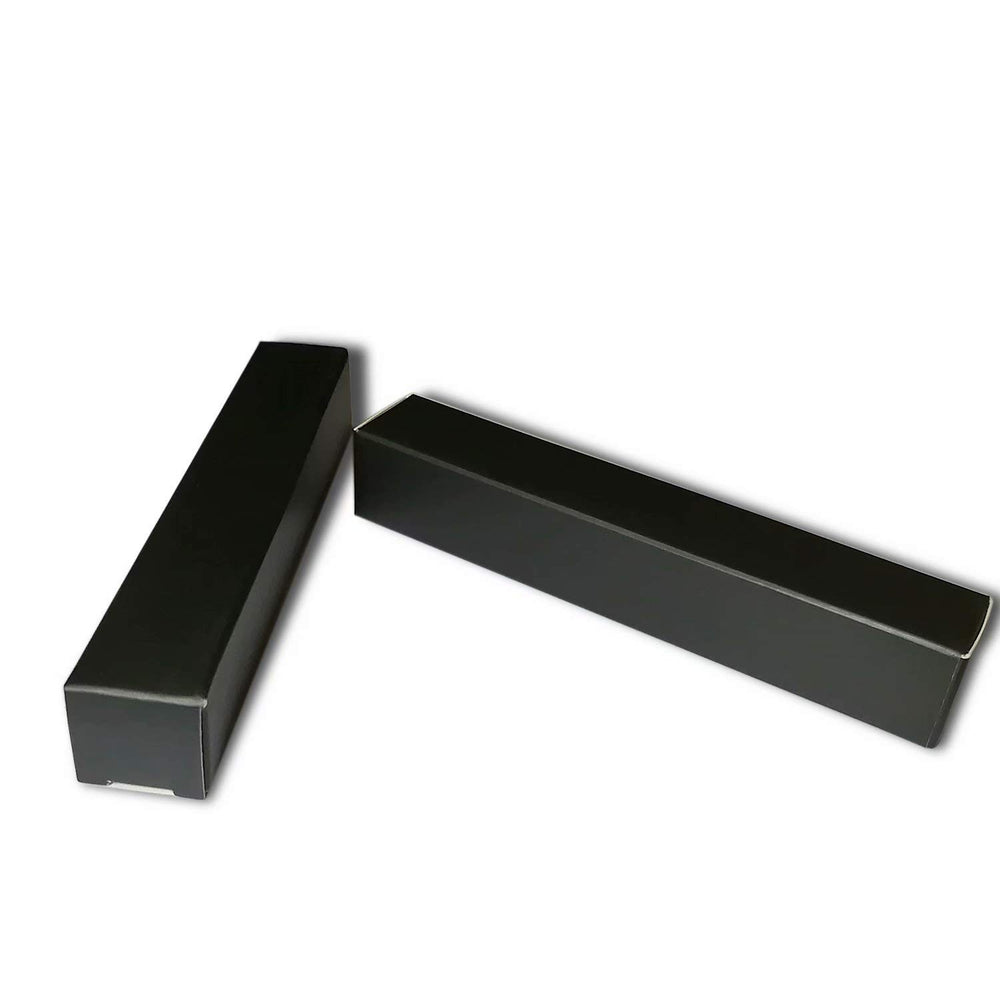 ANZKA box beside a lip gloss for scale showing exact fit and professional presentation