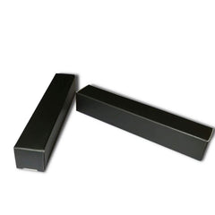 ANZKA box beside a lip gloss for scale showing exact fit and professional presentation