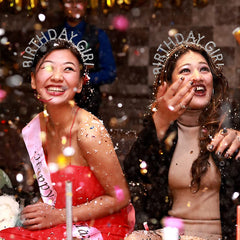 AOPRIE crown held in hand to show compact size and lightweight 1.3 ounce construction for comfort