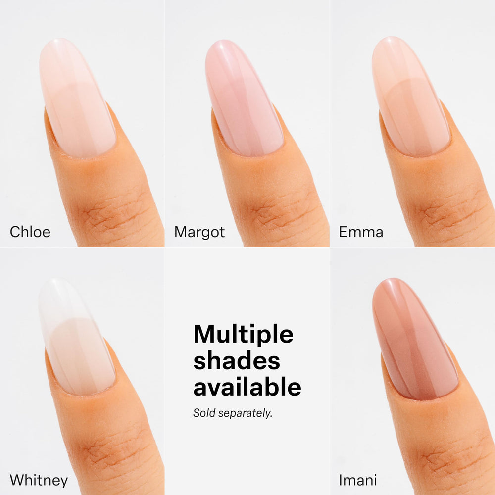 Hand with applied APRÉS Gel‑X tips to show scale and realistic almond short appearance
