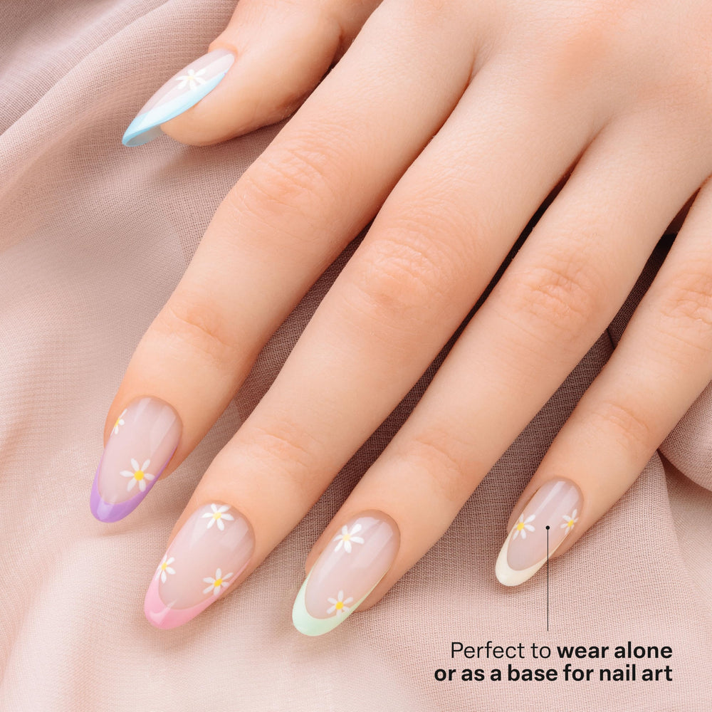 APRÉS Whitney tips in hand showing scale and lightweight gel benefit