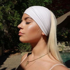AQOKKA headband worn by model showing stylish look and hands-free convenience benefit