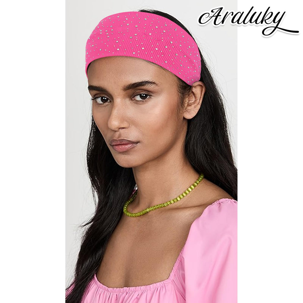 Araluky headband held in hand for scale showing compact, travel-friendly size